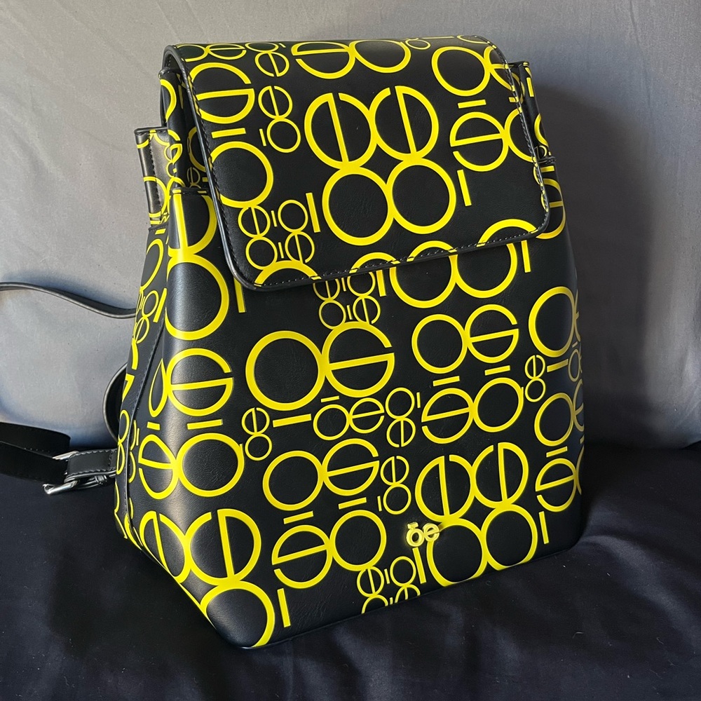 Cloe Backpack with Embossed Monogram Print in Yellow Color